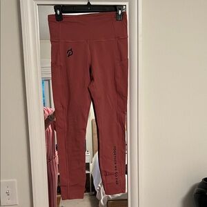 Peloton and Lululemon Women's Coral Leggings with Motivational Text